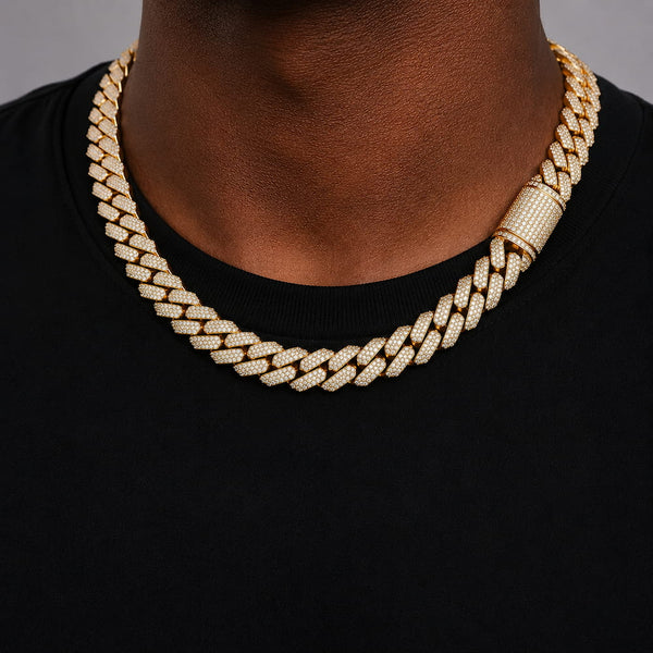 male model wearing a 12mm gold iced prong Cuban chain close up chest view