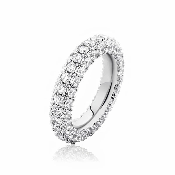 Triple row silver tennis ring featuring three rows of cubic zirconia stones in a polished silver finish.