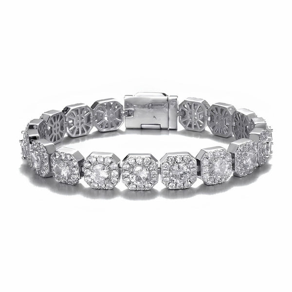 A silver-toned diamond bracelet featuring round and cushion-cut cubic zirconia in pavé settings, arranged in a continuous line with a clasp closure, shown on a white background.