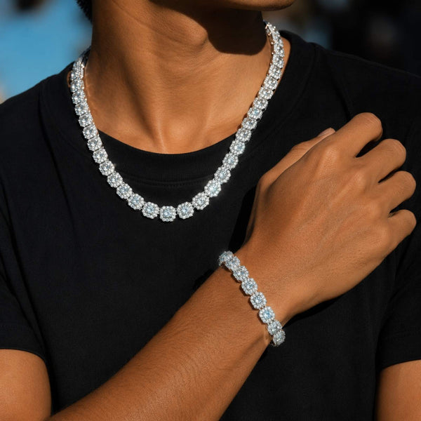 A close-up of a person wearing a sparkling cubic zirconia tennis chain and matching bracelet, with the necklace clearly displayed against the neck and wrist.