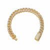Gold bracelet with cubic zirconia stones on a white background