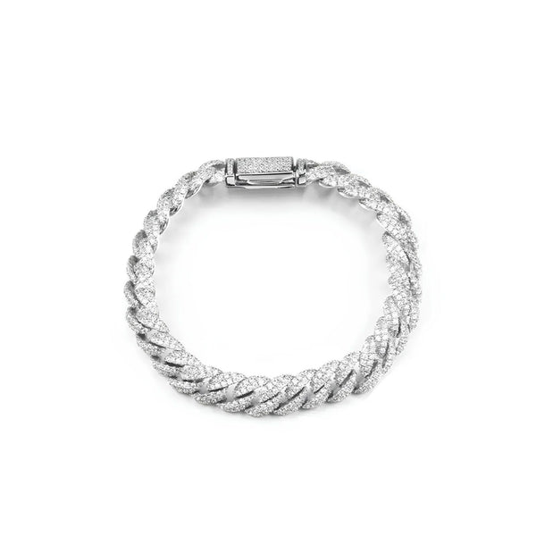Silver bracelet with clear gemstones on a white background
