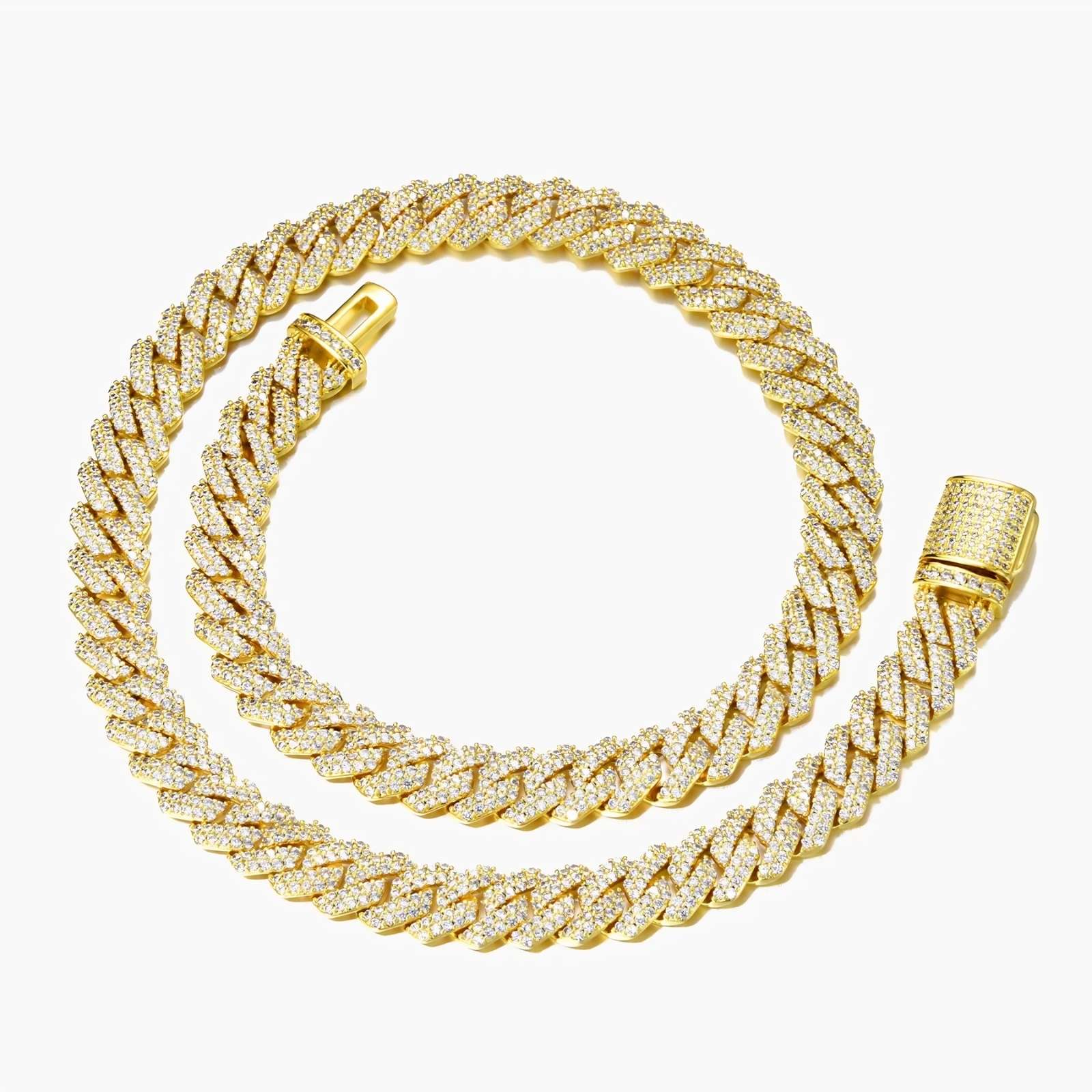 A gold-toned Cuban link chain paved with small clear stones, coiled on a light gray background.