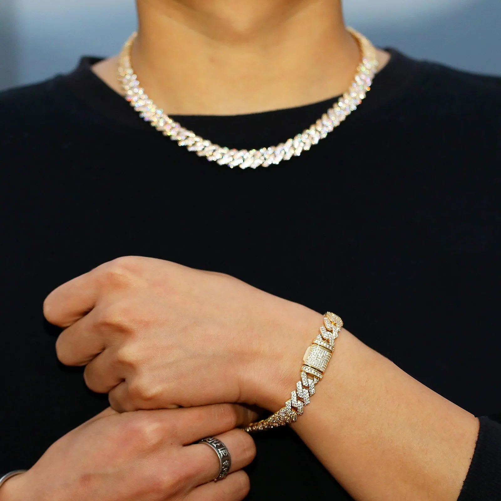 10mm gold iced prong Cuban bracelet worn by model