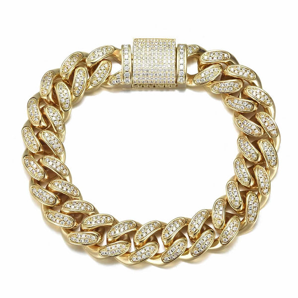 Gold chain bracelet with cubic zirconia stones on a white background