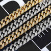 Four Cuban links in gold, silver, and two-tone finishes, each paved with small clear stones, arranged diagonally on a black and white graphic background.