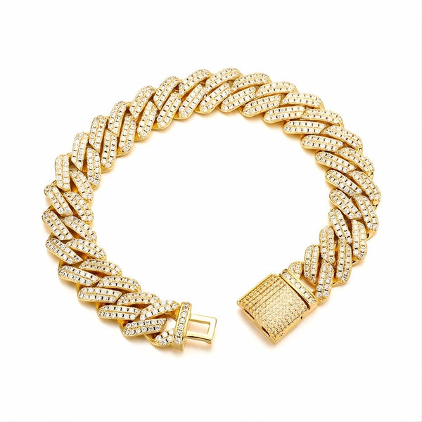 A gold-toned Cuban link bracelet paved with small clear stones, shown on a plain white background.