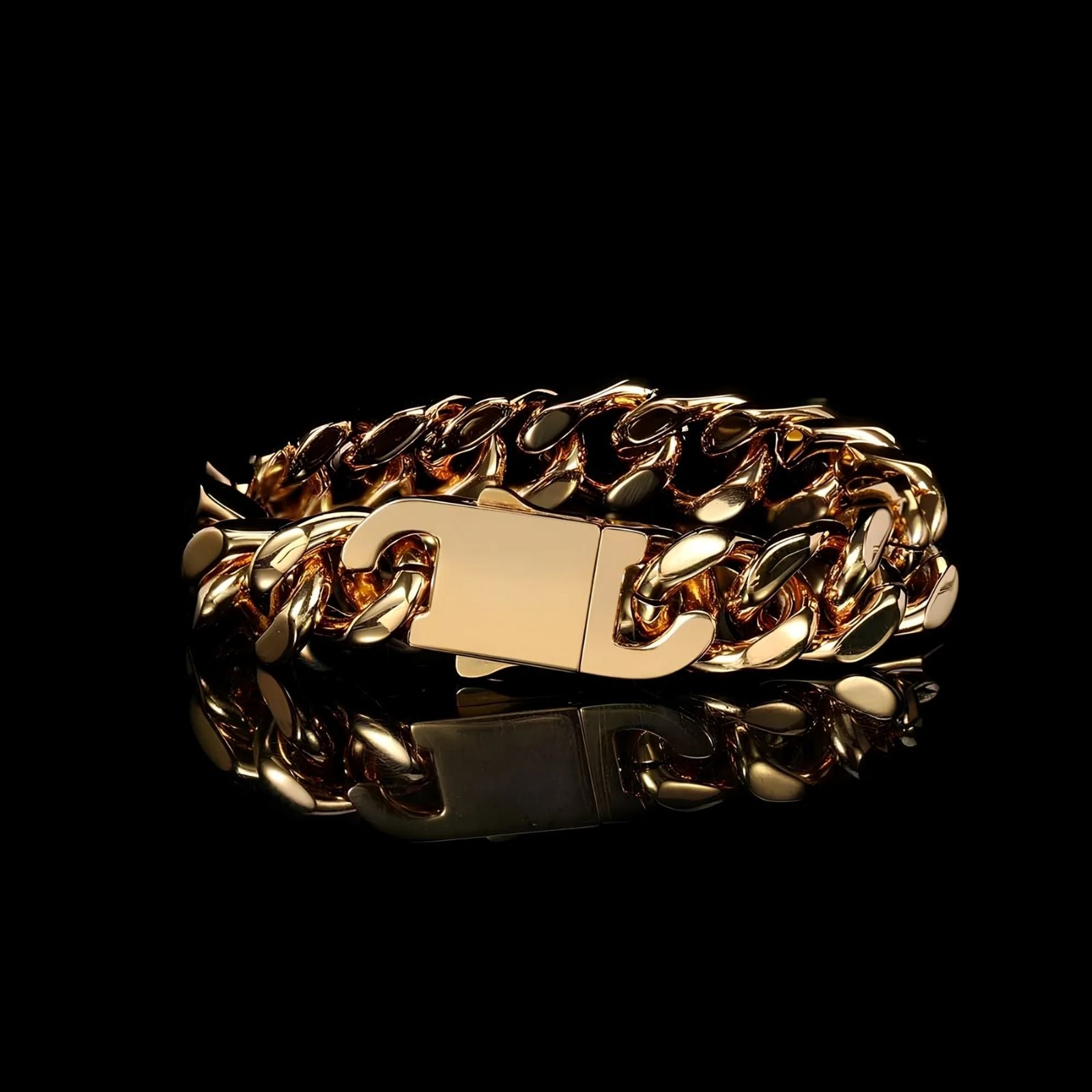 A gold-toned chunky chain link bracelet with a polished rectangular clasp, displayed on a reflective black surface against a solid black background.
