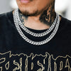 Model wearing 12mm silver iced Cuban link chain
