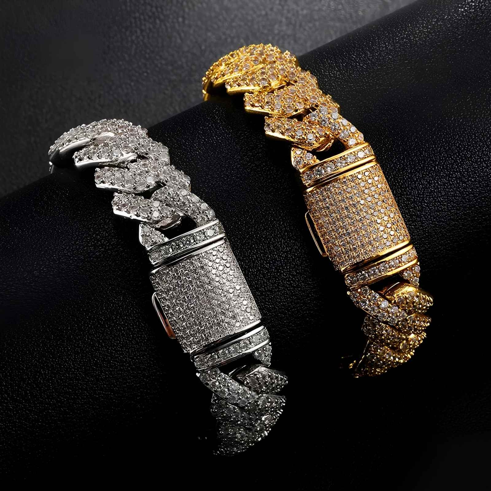 Two CUBAN bracelets, one gold and one silver, on a black background.