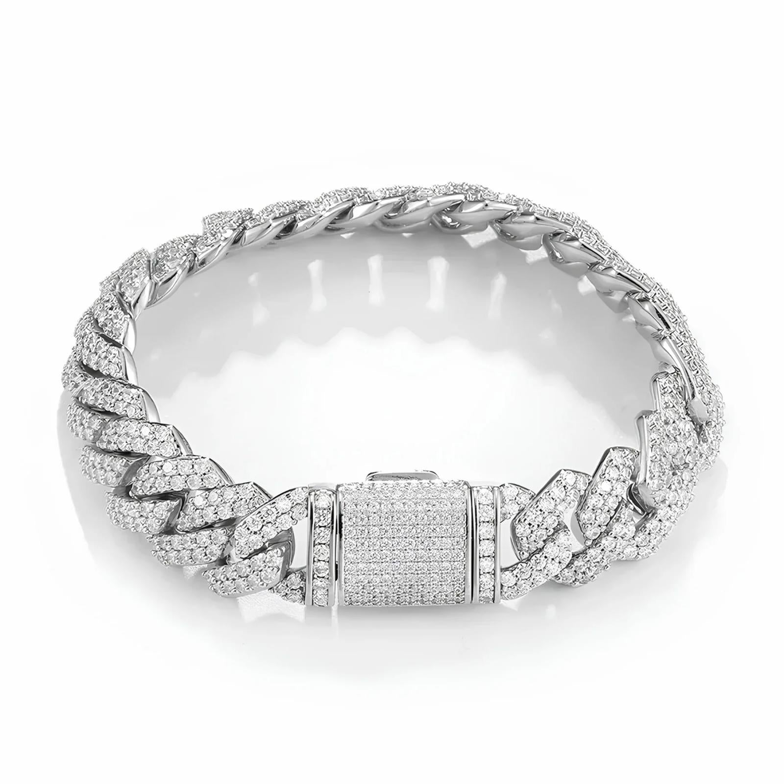 Silver cuban bracelet with cubic zirconia stones on a white background