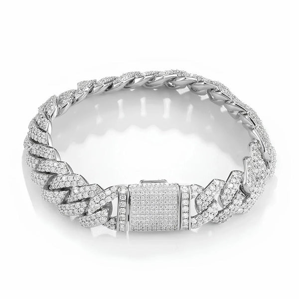Silver cuban bracelet with cubic zirconia stones on a white background