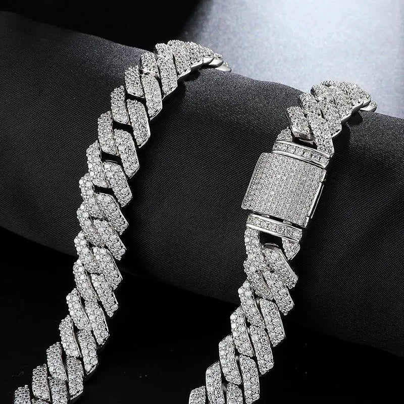 Close-up of 14mm iced silver prong Cuban chain links