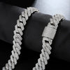 Close-up of 14mm iced silver prong Cuban chain links