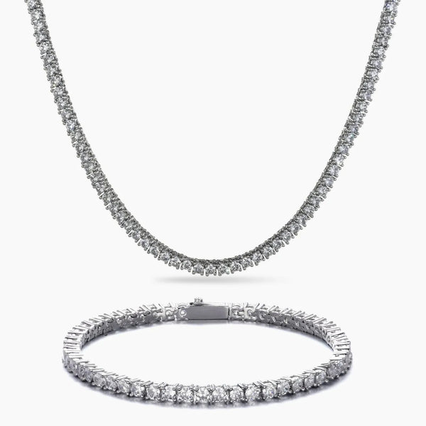 Cubic zirconia tennis necklace and bracelet set on a white background