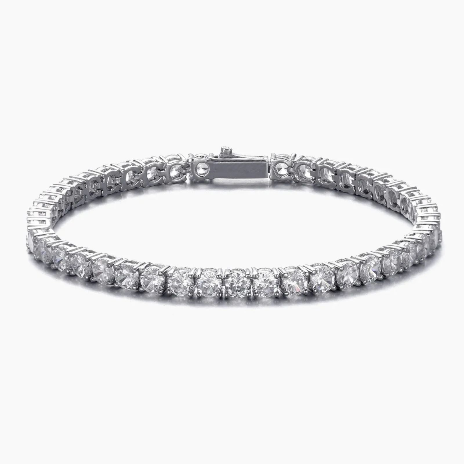 Silver tennis bracelet with clear cubic zirconia on a white background
