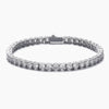 Silver tennis bracelet with clear cubic zirconia on a white background