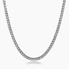 A silver-toned tennis necklace with a continuous line of small clear cubic zirconia, shown against a plain white background.