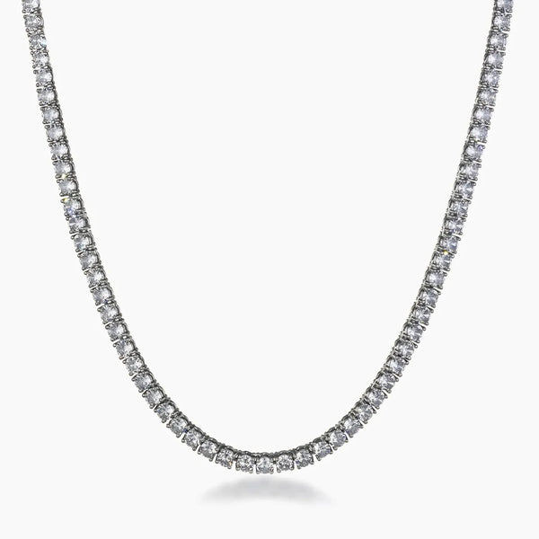 A silver-toned tennis necklace with a continuous line of small clear cubic zirconia, shown against a plain white background.