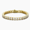 Gold tennis bracelet with clear cubic zirconia on a white background