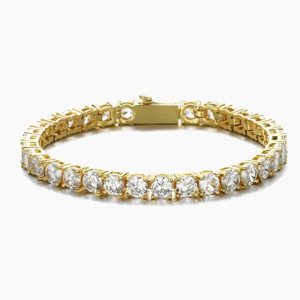 Gold tennis bracelet with clear cubic zirconia on a white background