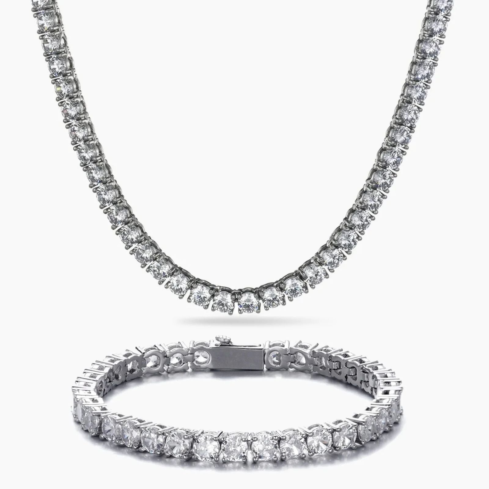 A silver-tone tennis necklace and matching bracelet set, both adorned with clear round-cut cubic zirconia, displayed on a clean white background.