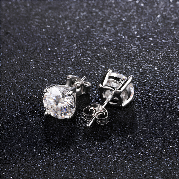 Angled view of 5mm moissanite stud earrings in 925 sterling silver