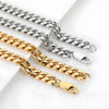 Two gold and one silver chain on a white background