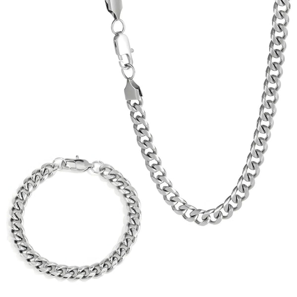 Silver chain necklace and bracelet set on a white background