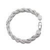 Silver bracelet with a rope design on a white background