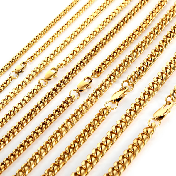 Close-up of gold 8mm Miami Cuban chain links.