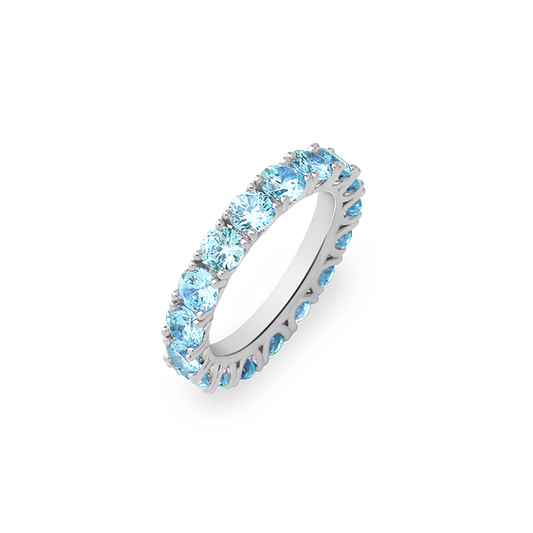 Silver tennis ring featuring baby blue cubic zirconia stones.