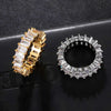 Gold and silver rings on a dark textured surface
