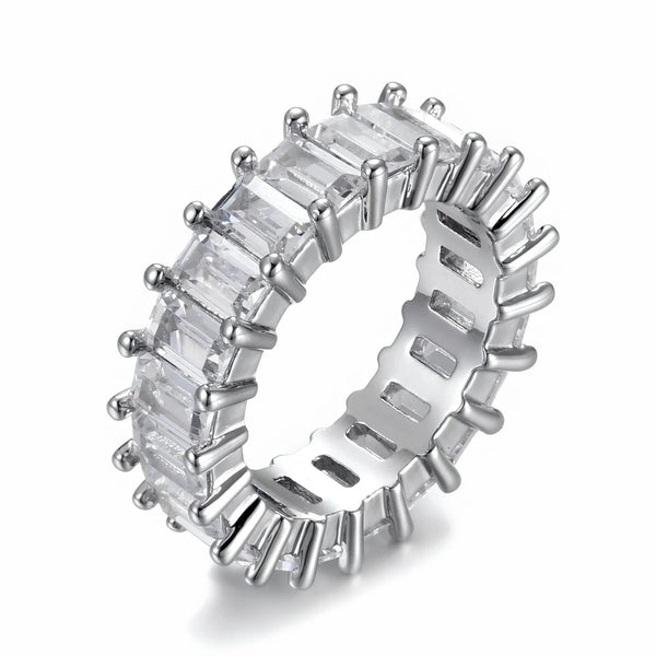 Silver ring with baguette-cut cubic zirconia on a white background