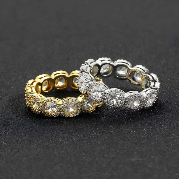 Two rings, one gold and one silver, on a black background