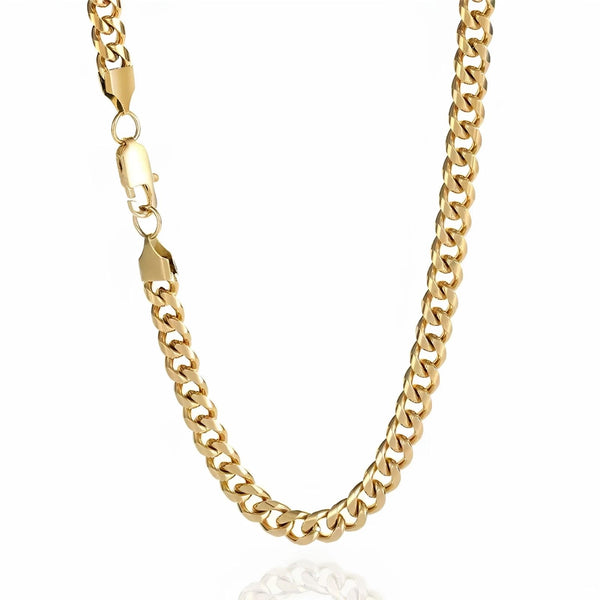 A gold-toned Cuban link chain necklace with a lobster clasp, shown draped against a clean white background.