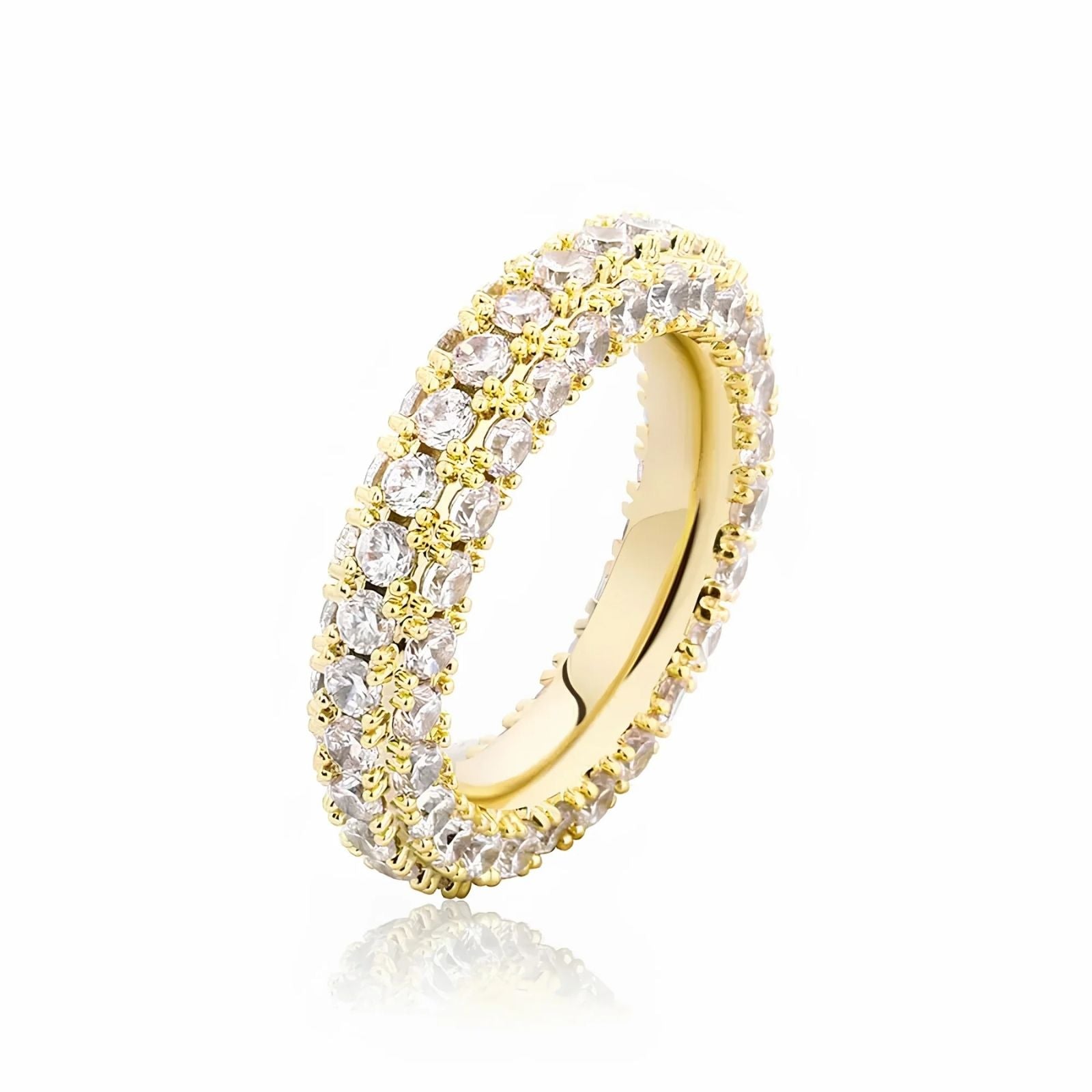 Gold ring with embedded cubic zirconia on a white background