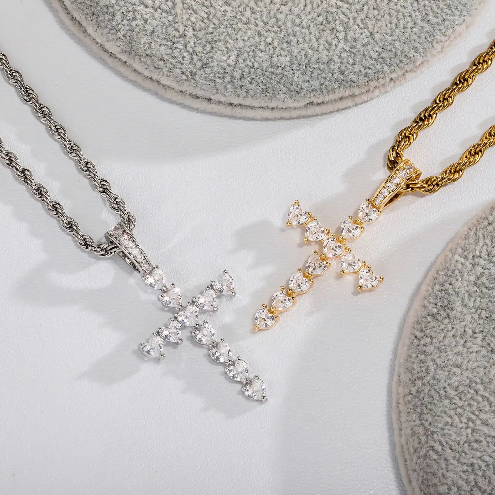 Classic Heart Cross Pendant shown in both gold and silver finishes side by side.