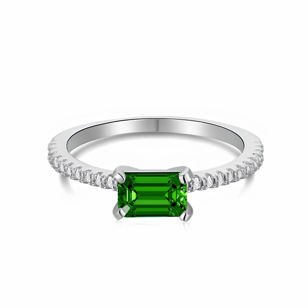 Emerald green solitaire ring in 925 sterling silver with cubic zirconia pavé band