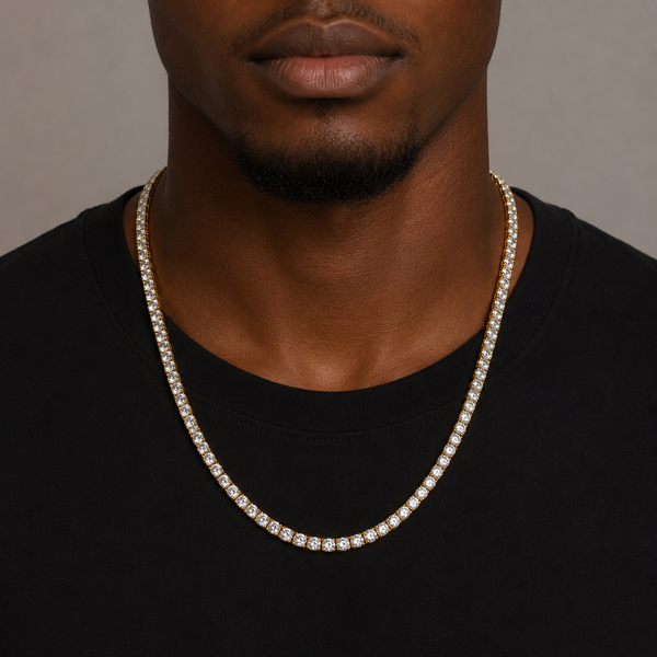 Man wearing a 4mm gold tennis chain necklace
