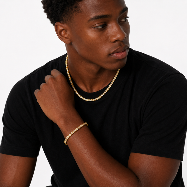 Man wearing a gold tennis chain and bracelet set