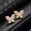 Gold pavé butterfly stud earrings with cubic zirconia stones