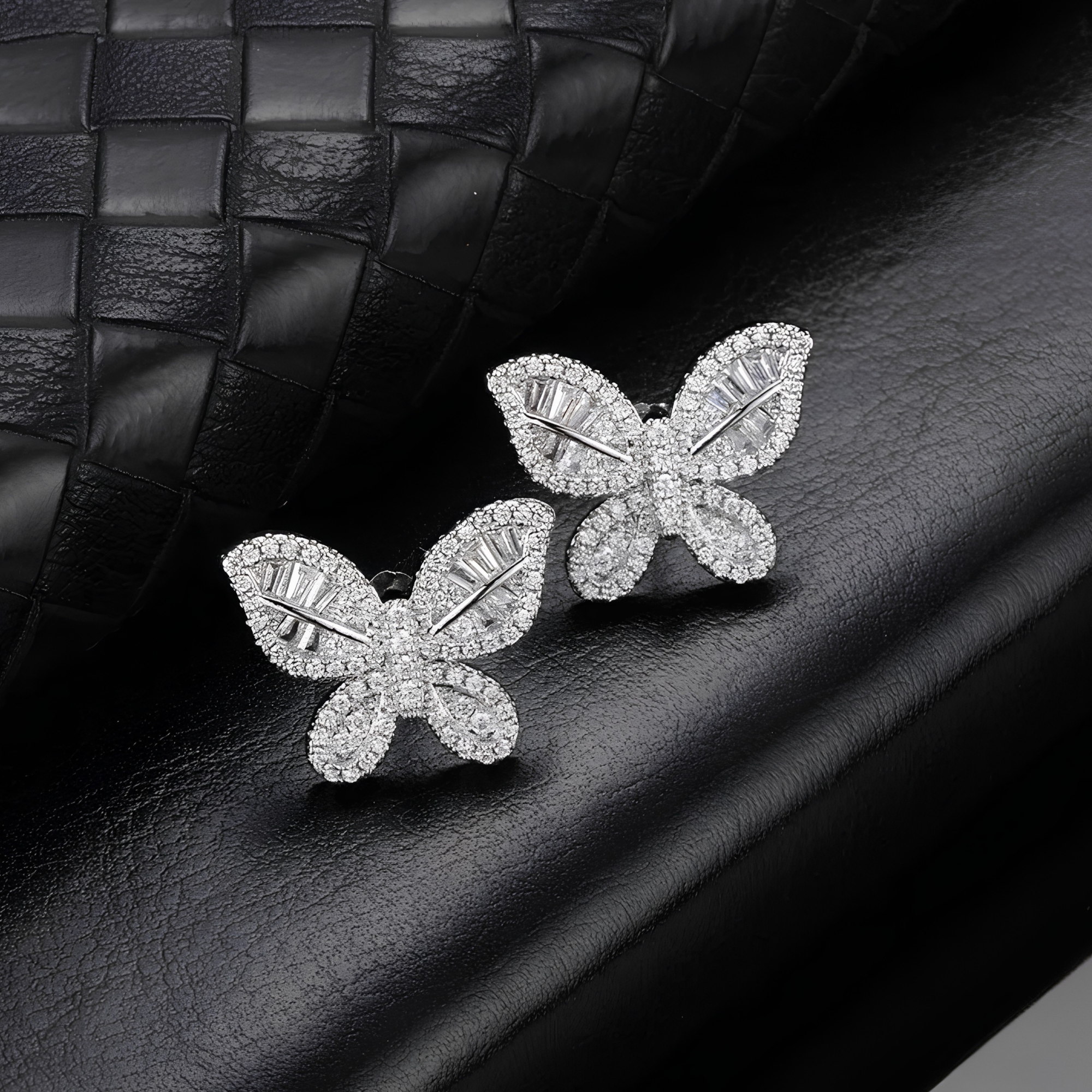 Silver pavé butterfly stud earrings with cubic zirconia stones