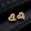 Gold pavé heart stud earrings with cubic zirconia stones