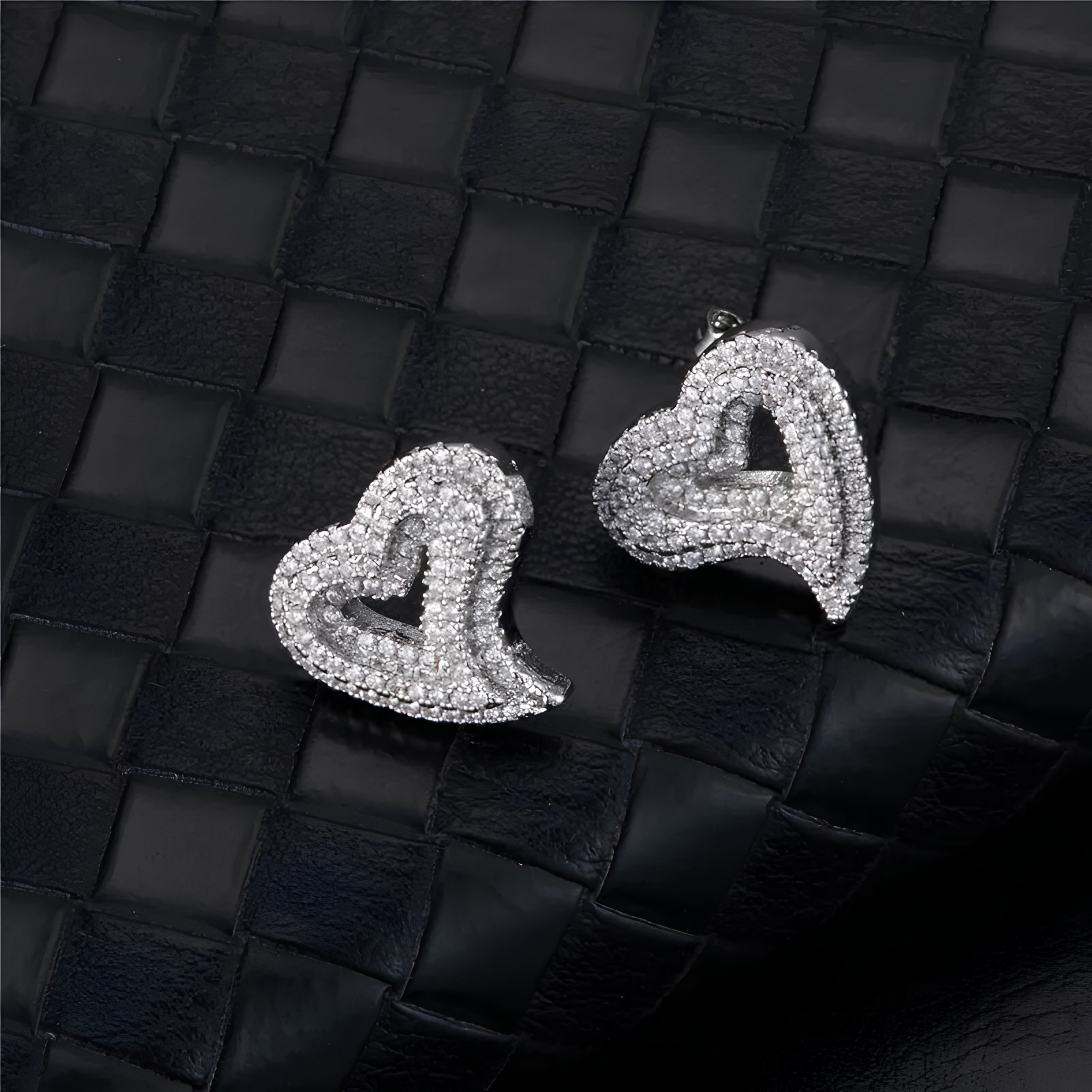 Silver pavé heart stud earrings with cubic zirconia stones